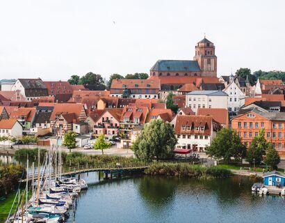 Air absorption over Volgast with St. Petri Church, still water in the front.