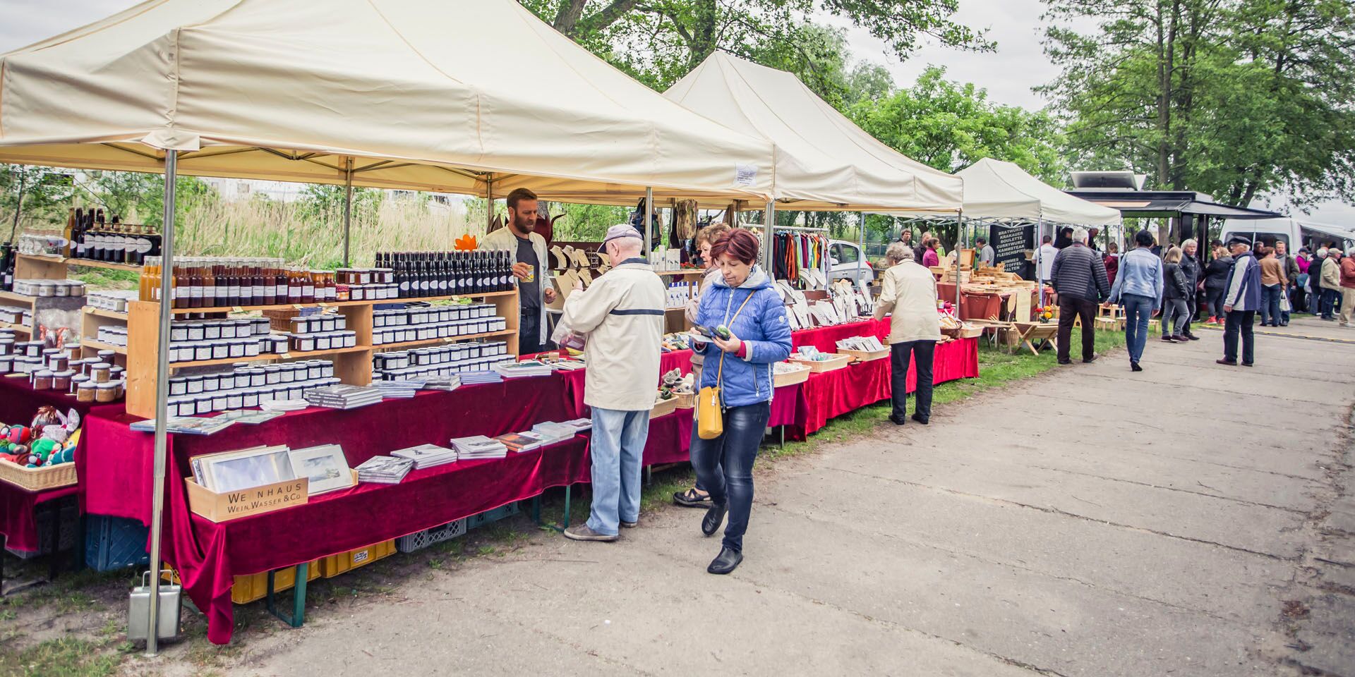 Different stands with different products on the Fischmarkt Altwarp